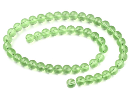 Skleněné korálky průhledný křišťál 6mm cca 50ks - světle zelené