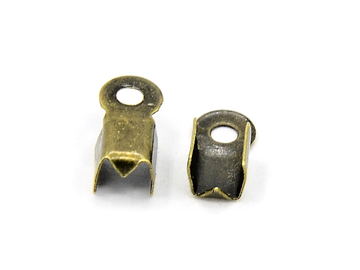 Bižuterní zamačkávací ukončení - sklápěcí 9x3,5mm 10g - antické bronzové